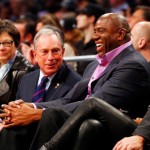 Current Mayor of New York City Michael Bloomberg sits with NBA legend Earvin "Magic" Johnson